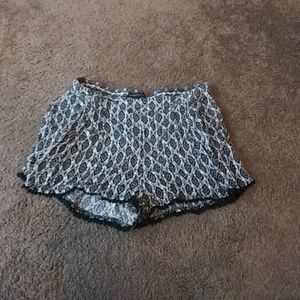 Comfy black and white shorts w/ fuzzy balls